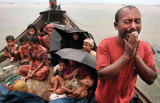 Rohingya Muslim bettelt um Einlass in Bangladesh